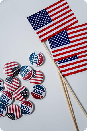 American flag and vote buttons